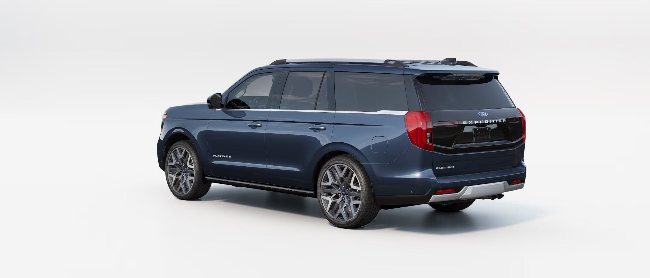 Rear-side view of a blue Ford Expedition Platinum, highlighting its stylish design and premium features.