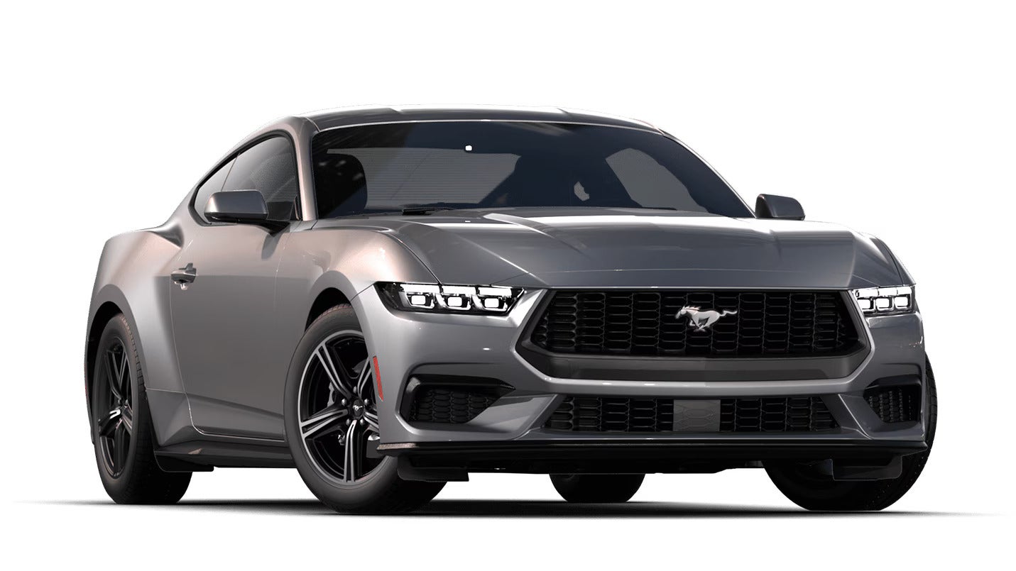 Front view of a silver 2025 Ford Mustang EcoBoost showcasing its bold design and signature pony logo.