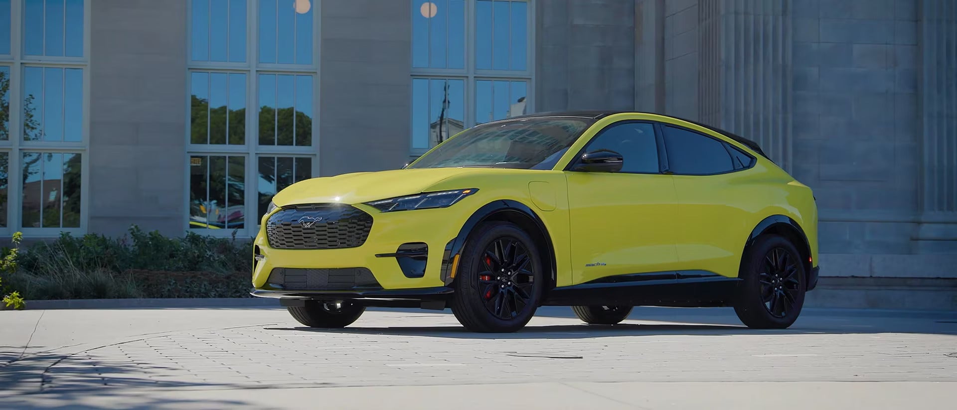 A yellow car sitting parked.