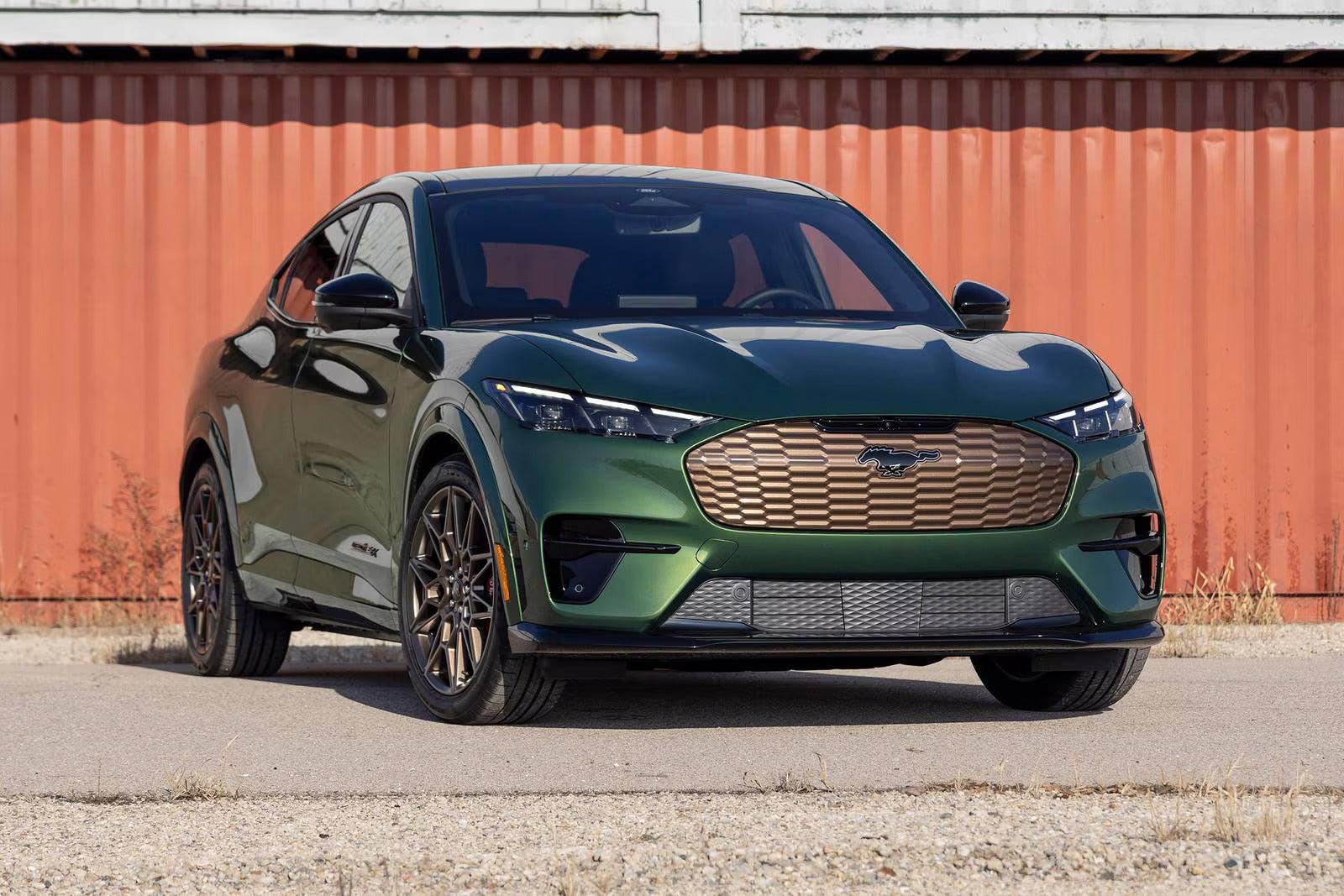 A green car sitting parked.